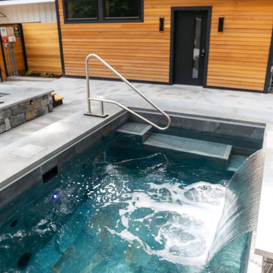 Illustrative licensed photograph: Completed backyard pool and pool house