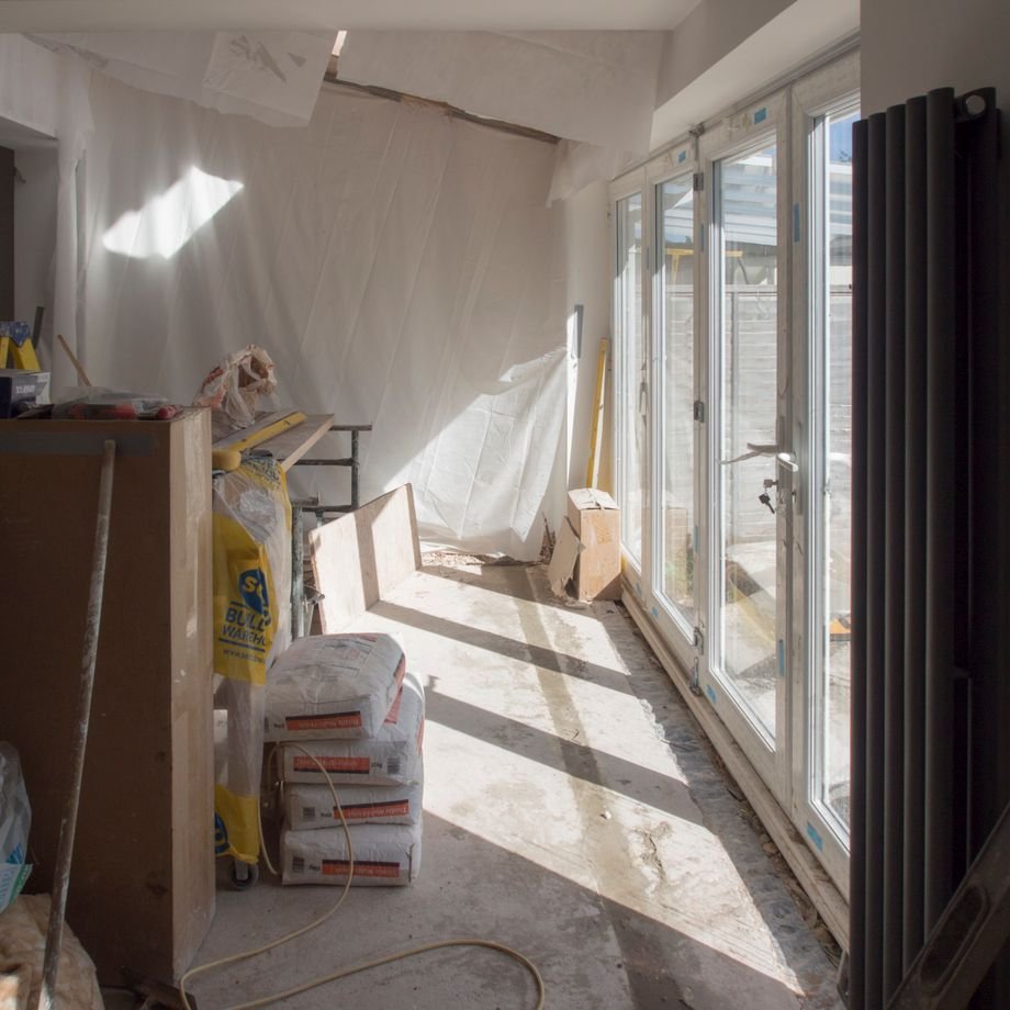 Illustrative licensed photograph: Windowed residential room during renovation