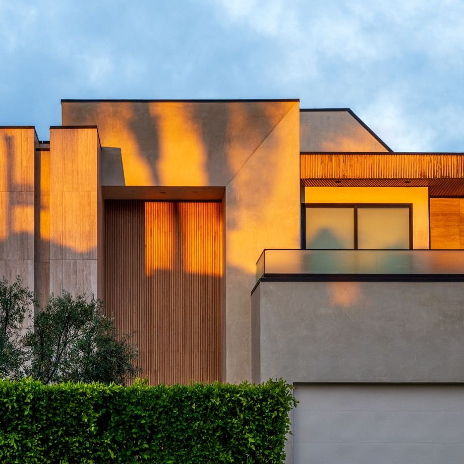 Illustrative licensed photograph: Architectural home at dusk